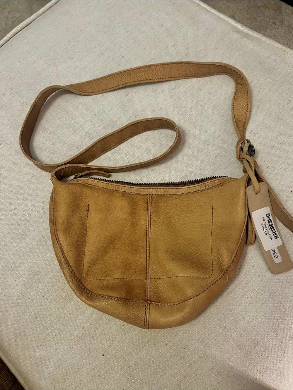 NWT Hideaway Leather Sling Bag